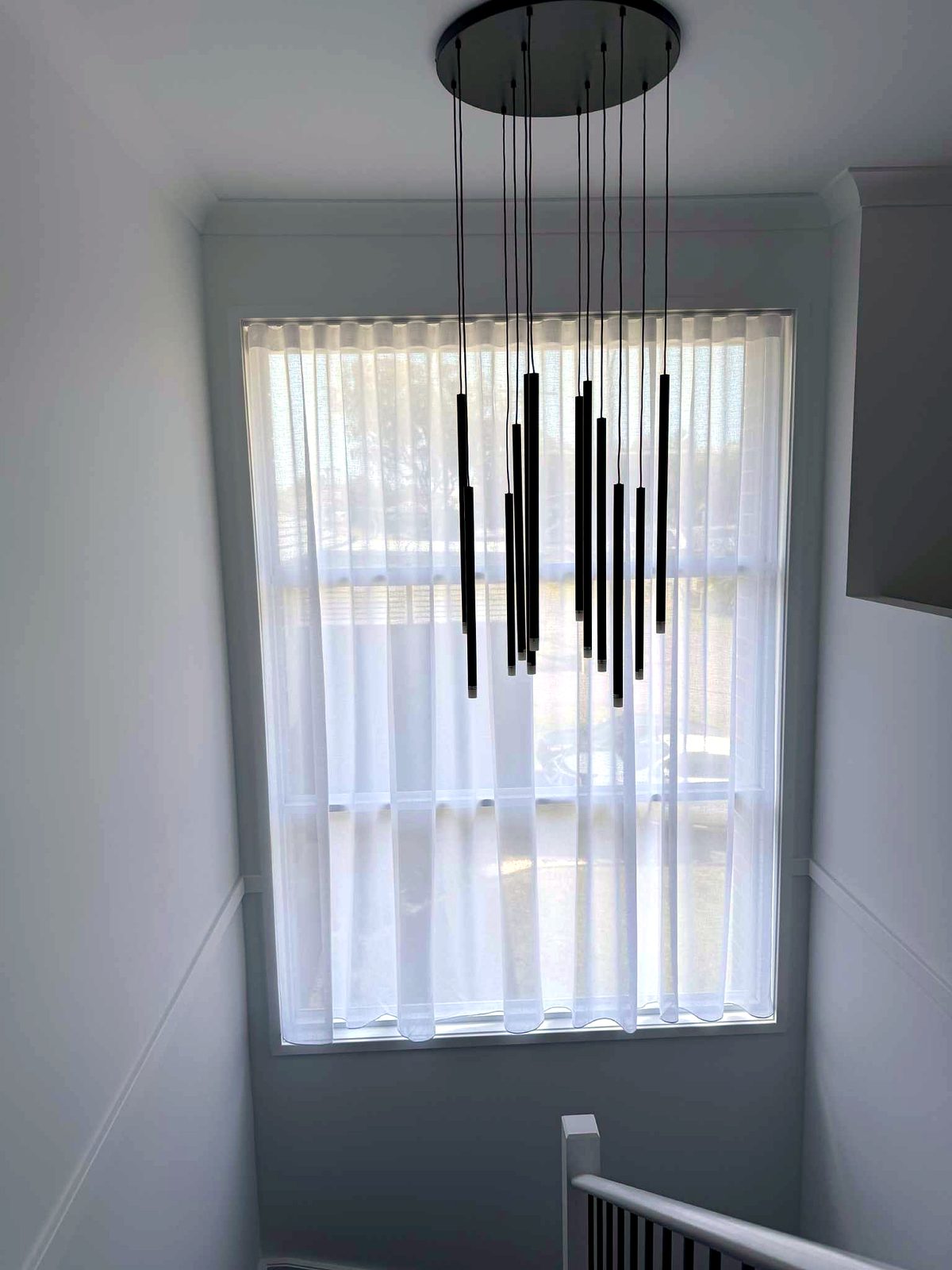 Custom Curtains install by Coastal Plantation Shutters