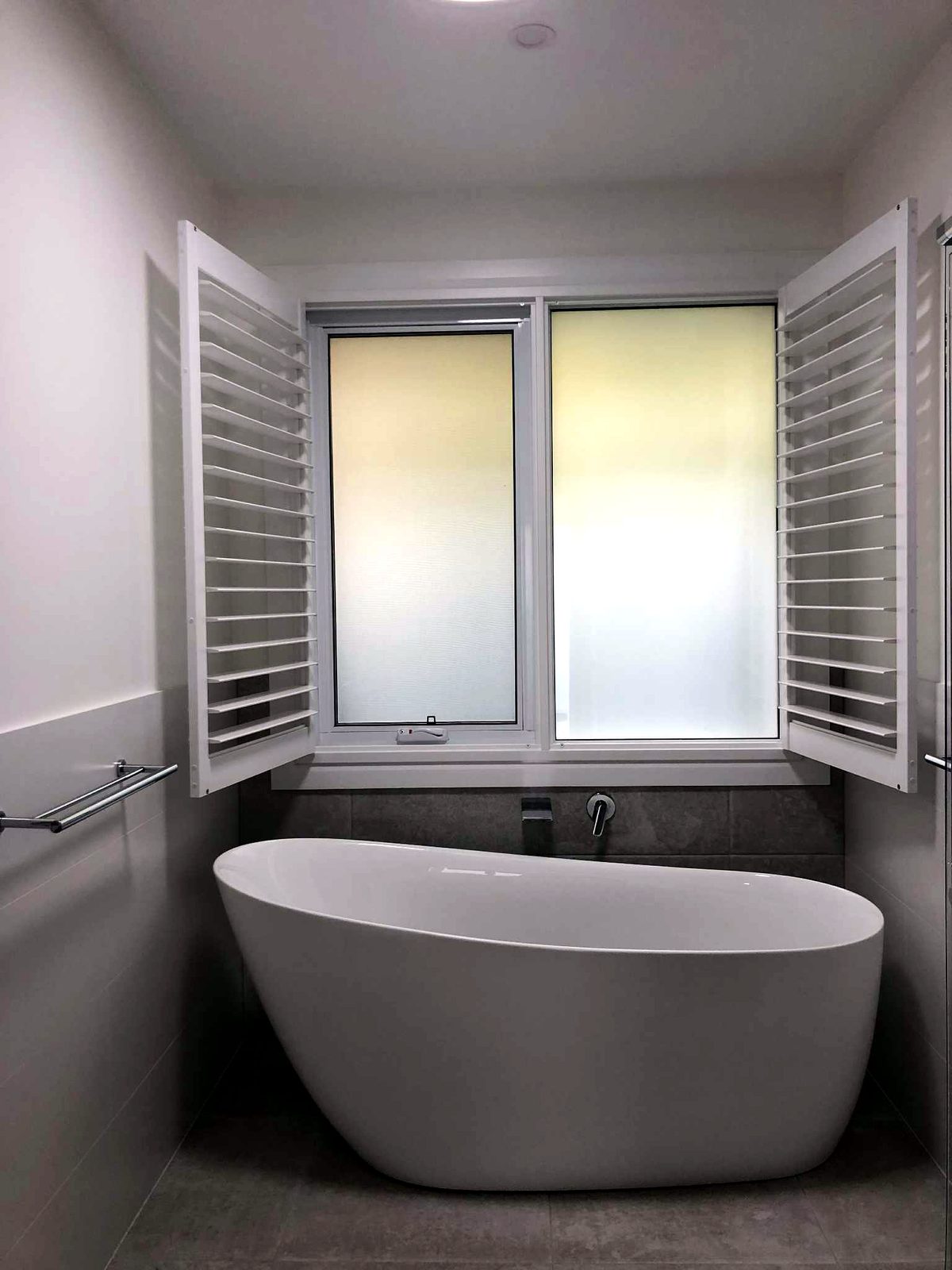 PVC Polymer Shutters install by Coastal Plantation Shutters