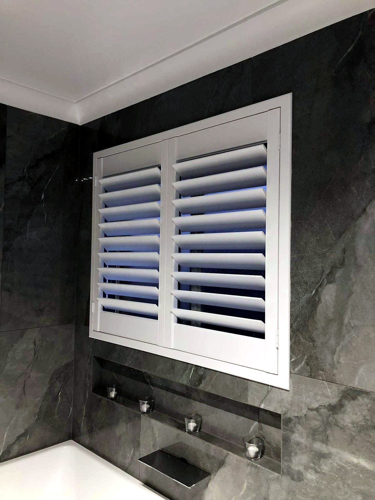 PVC Polymer Shutters install by Coastal Plantation Shutters
